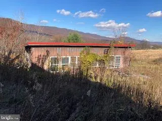 a view of outdoor space and mountain view