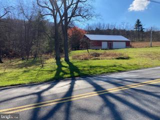 18493 Amberson Road Spring Run, PA 17262 - Photo 30 of 35 a view of a house with a yard