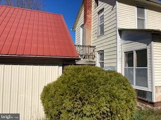 a blue house with outdoor space