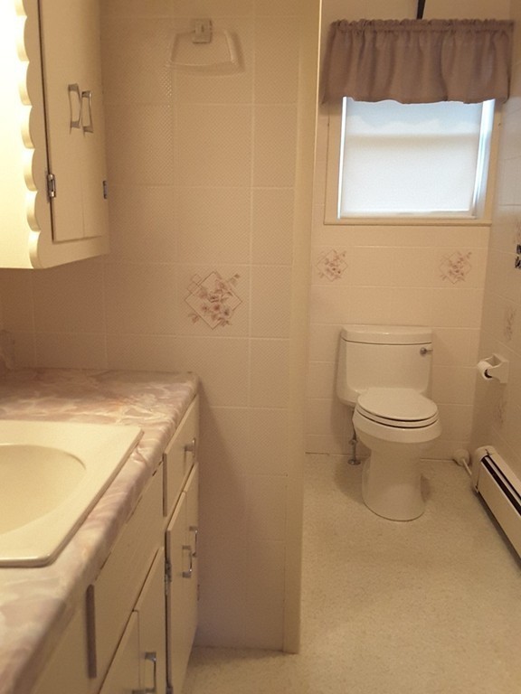 82 Monson Turnpike Road Ware, MA 01082 - Photo 12 of 29 a bathroom with a sink and a toilet