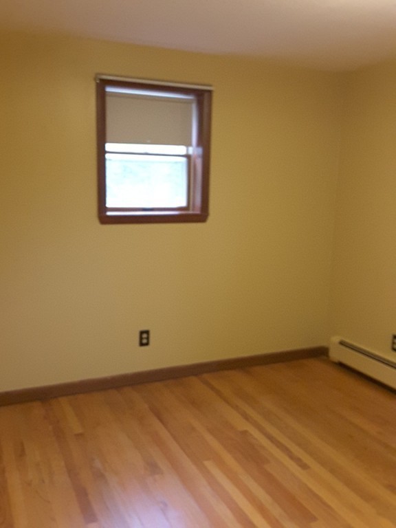 82 Monson Turnpike Road Ware, MA 01082 - Photo 14 of 29 an empty room with a window
