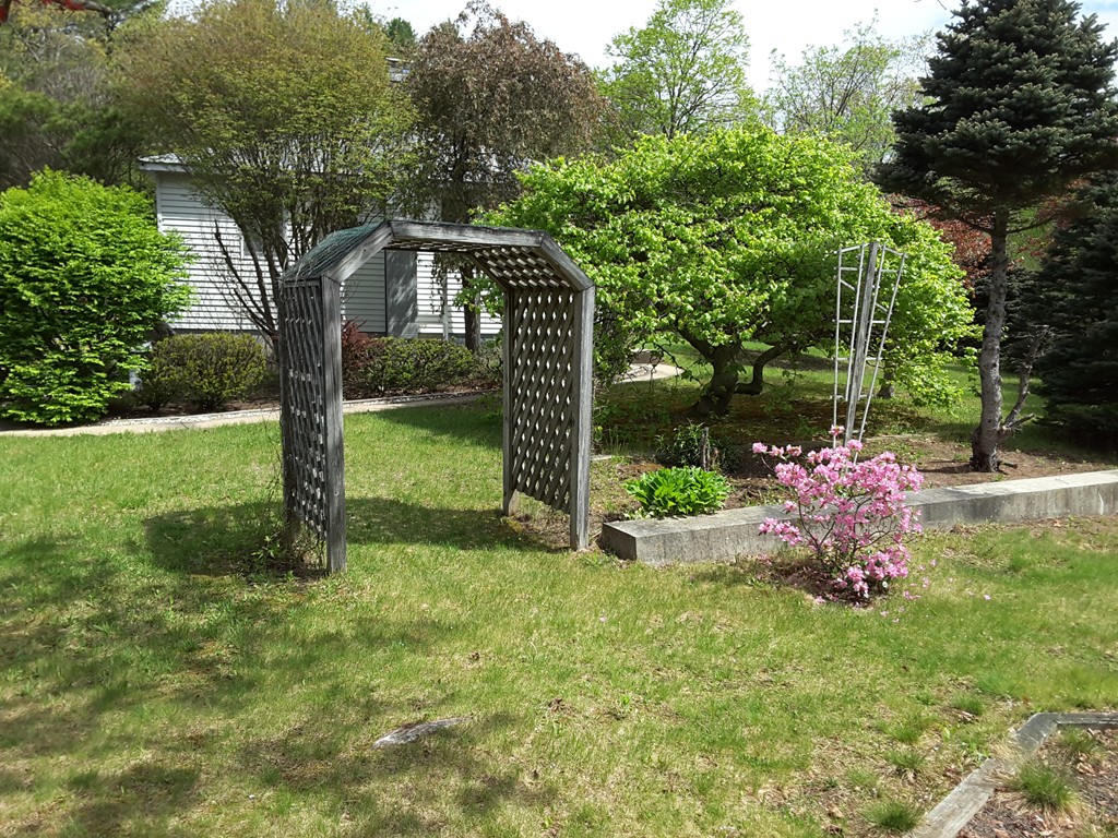 82 Monson Turnpike Road Ware, MA 01082 - Photo 19 of 29 a front view of a house with garden