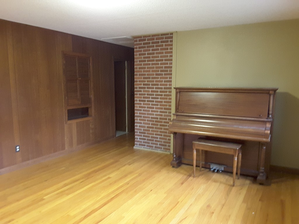 82 Monson Turnpike Road Ware, MA 01082 - Photo 9 of 29 a view of an empty room with wooden floor