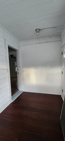 a view of wooden floor and staircase in a room