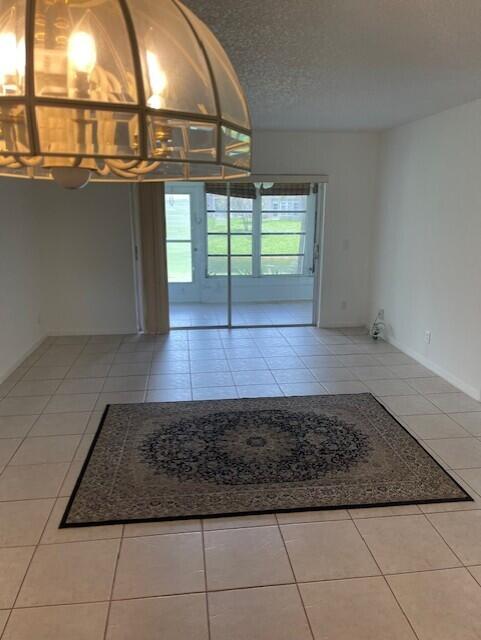 2901 Fiore Way, Unit 103 Delray Beach, FL 33445 - Photo 26 of 29 a view of entryway