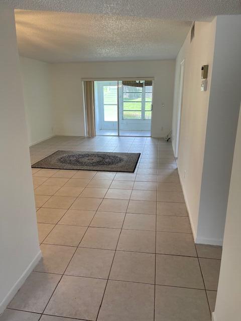 2901 Fiore Way, Unit 103 Delray Beach, FL 33445 - Photo 7 of 29 a view of a kitchen