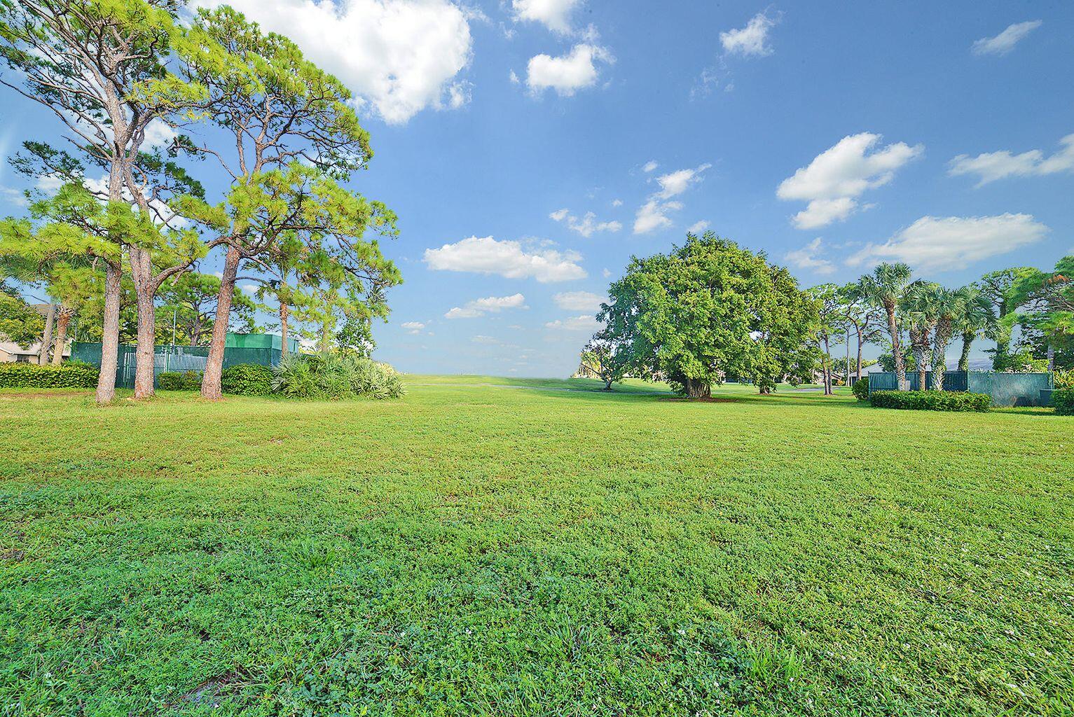 2901 Fiore Way, Unit 103 Delray Beach, FL 33445 - Photo 9 of 29 a view of yard with green space