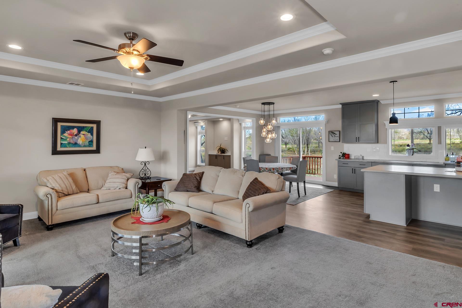 21357 Knight Road Austin, CO 81410 - Photo 11 of 35 a living room with furniture and kitchen view
