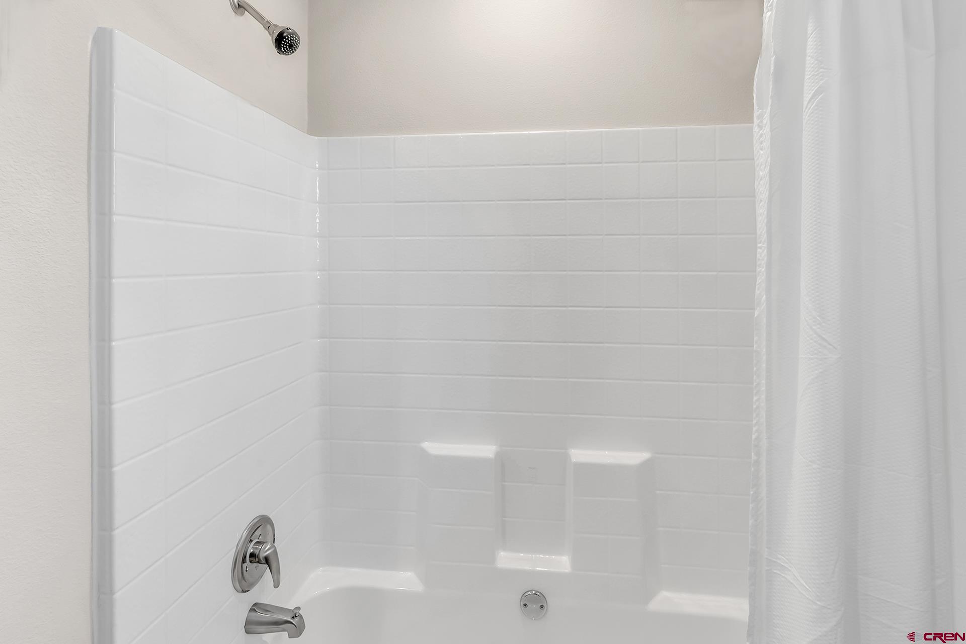21357 Knight Road Austin, CO 81410 - Photo 25 of 35 a bathroom with a bathtub