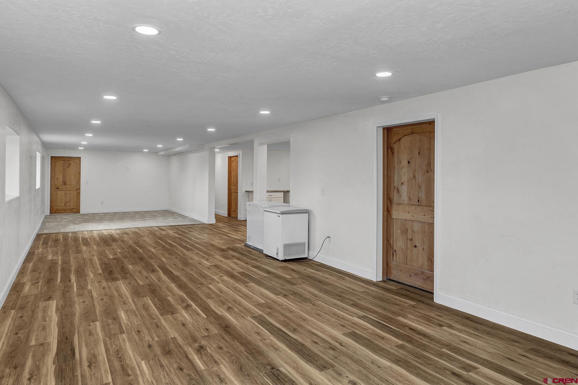 21357 Knight Road Austin, CO 81410 - Photo 26 of 35 a view of empty room with wooden floor