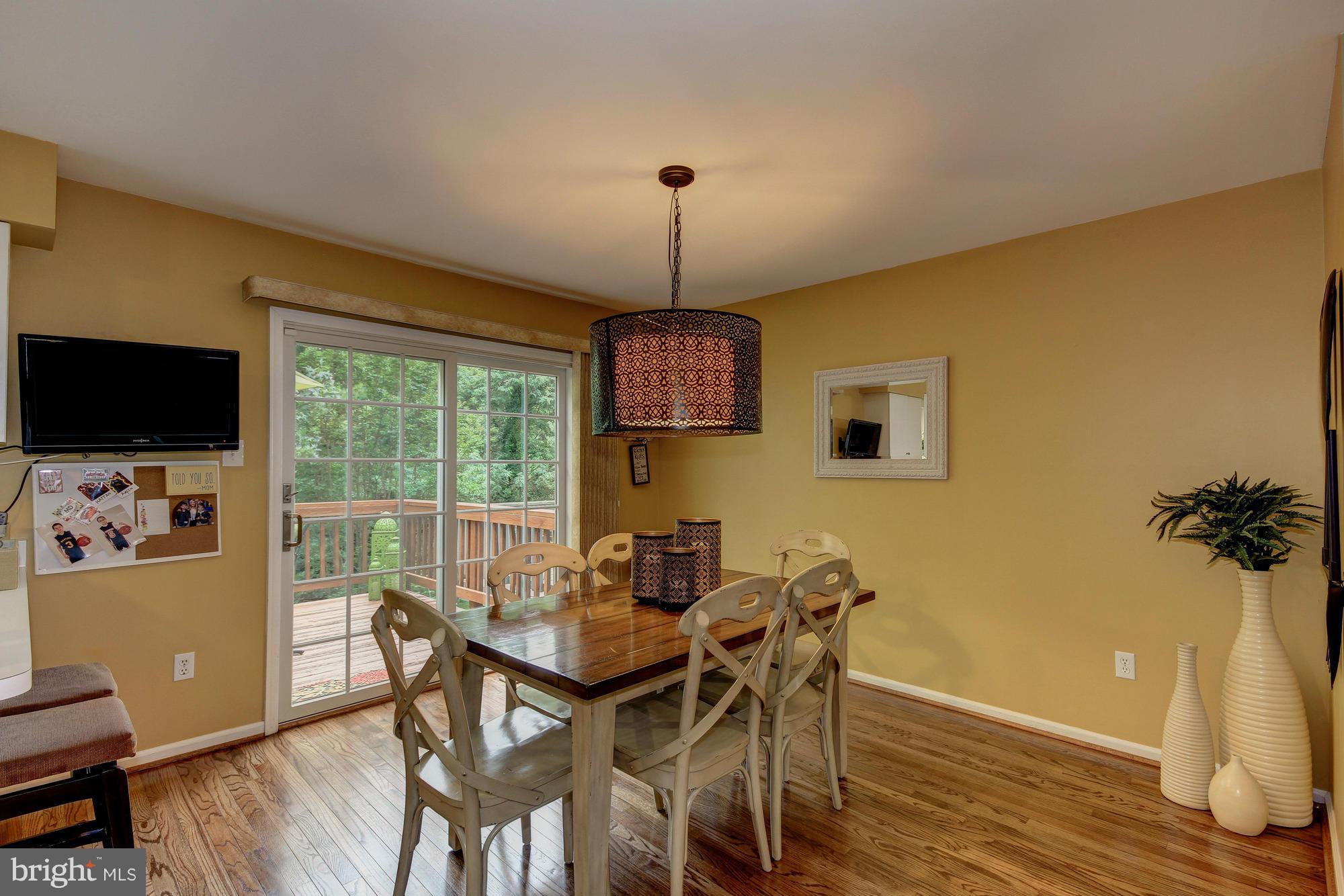 6162 Good Hunters Ride Columbia, MD 21045 - Photo 11 of 30 a dining room with furniture and window
