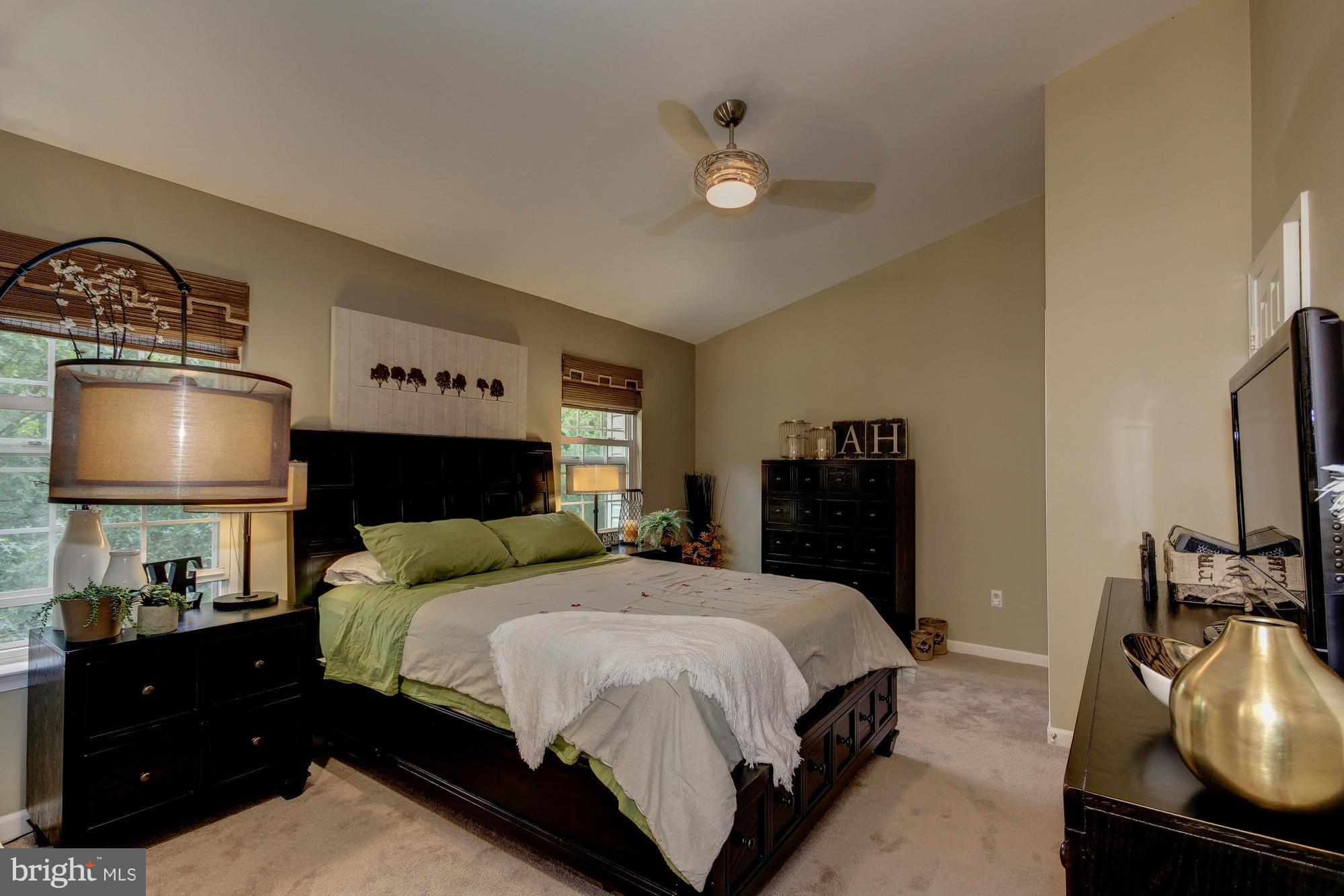 6162 Good Hunters Ride Columbia, MD 21045 - Photo 15 of 30 a bedroom with a bed and a dresser