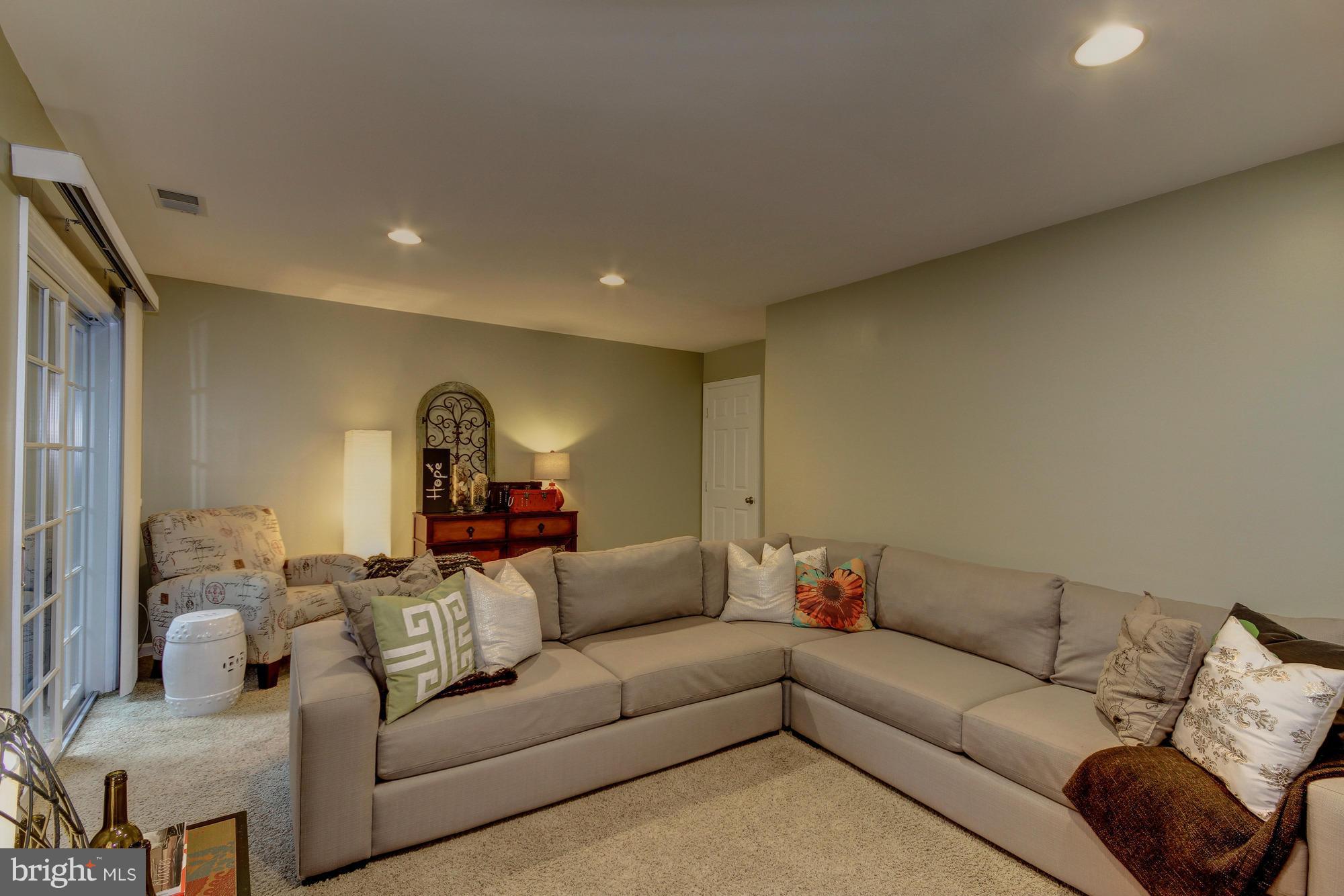 6162 Good Hunters Ride Columbia, MD 21045 - Photo 23 of 30 a living room with a couch