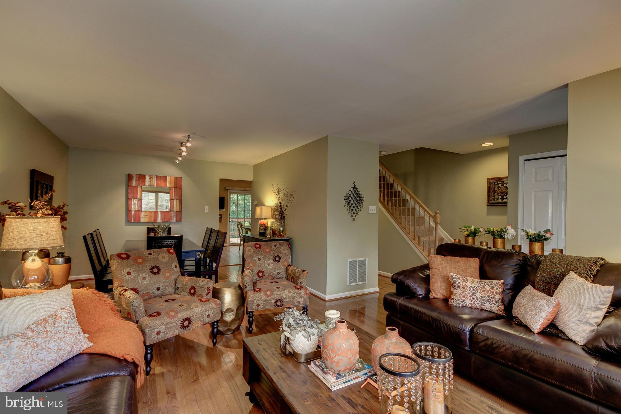 6162 Good Hunters Ride Columbia, MD 21045 - Photo 4 of 30 a living room with furniture and wooden floor