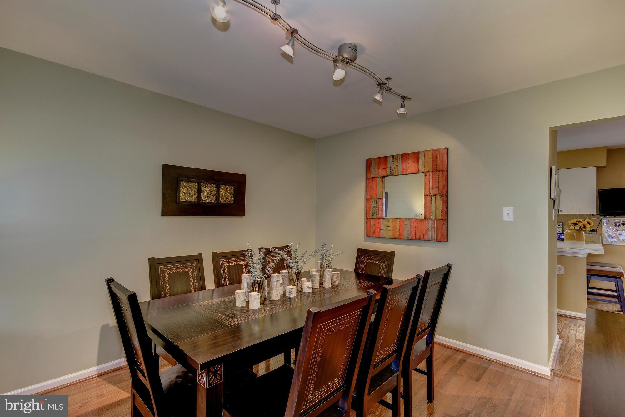 6162 Good Hunters Ride Columbia, MD 21045 - Photo 6 of 30 a view of a dining room with furniture