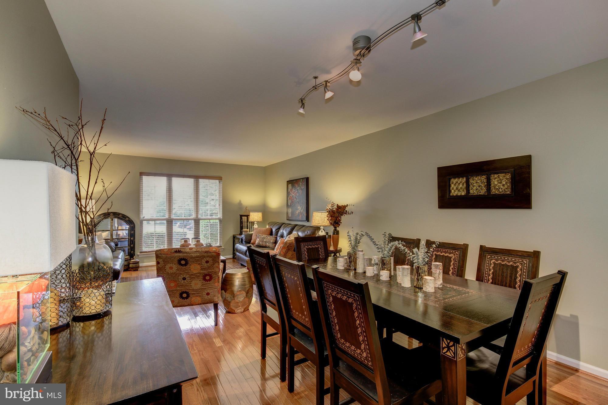 6162 Good Hunters Ride Columbia, MD 21045 - Photo 7 of 30 a view of a dining room with furniture