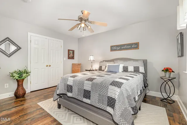 a dining room with a table and chairs