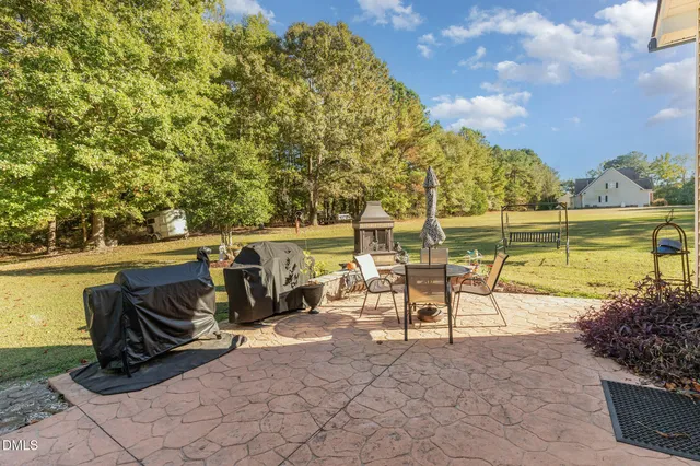 a bedroom with bed and window