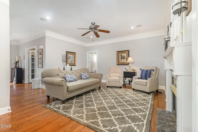 a kitchen with stainless steel appliances granite countertop a sink and a refrigerator