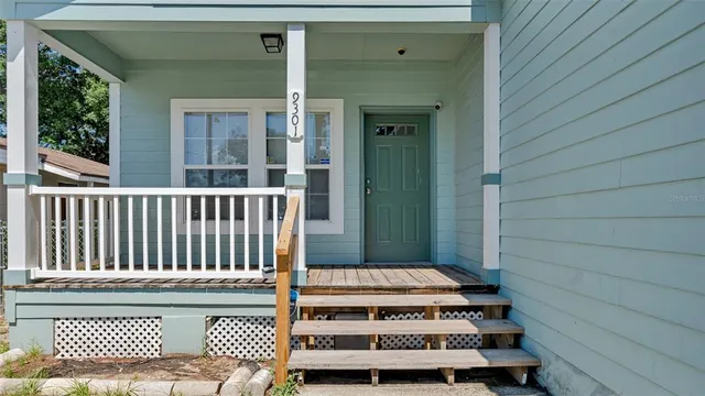 a view of a door with a chairs