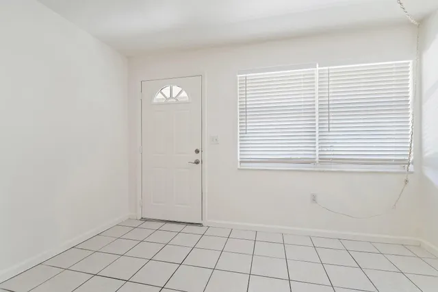 a view of an empty room with window
