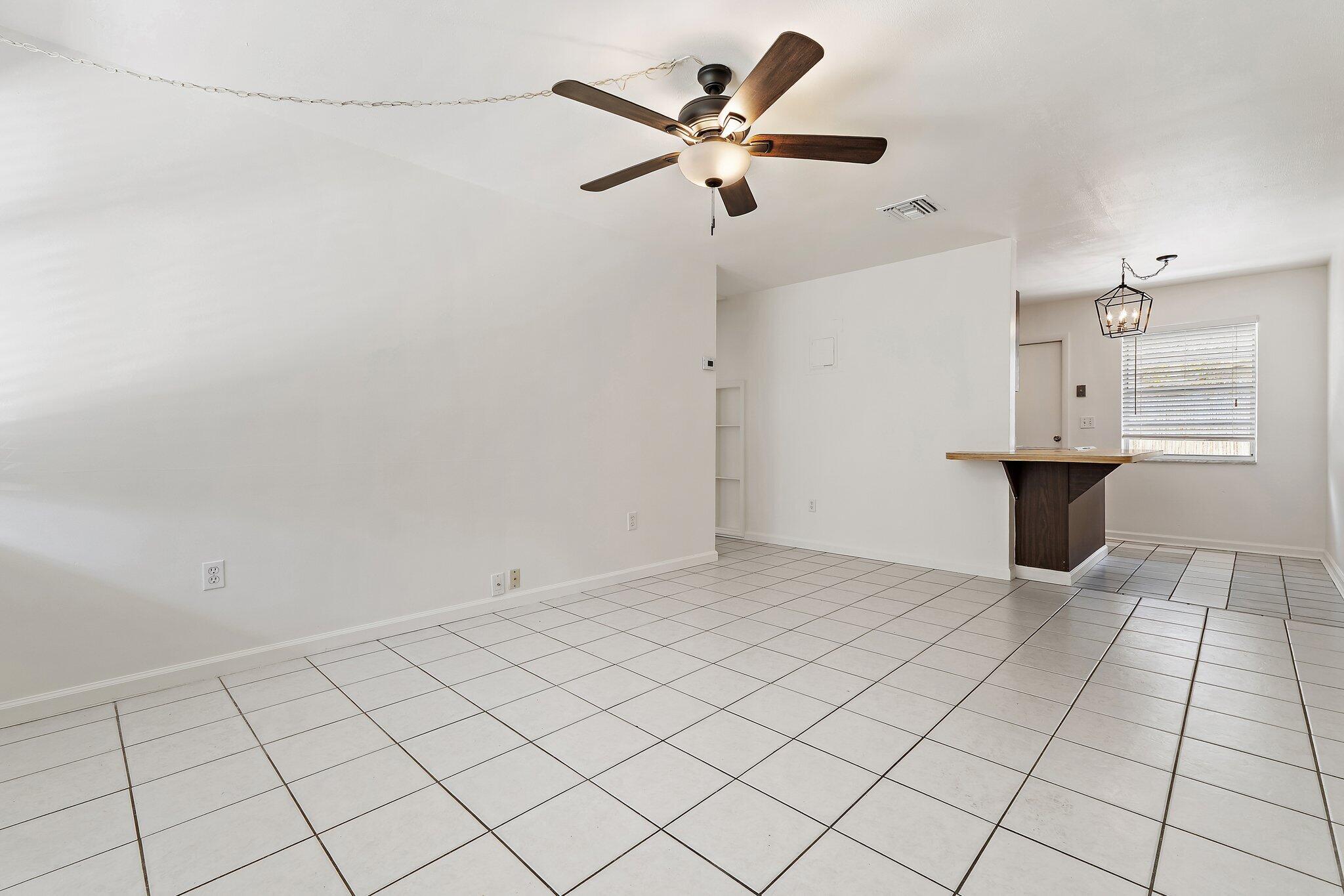 19147 Southeast Hillcrest Drive, Unit A Jupiter, FL 33469 - Photo 4 of 17 a view of an empty room