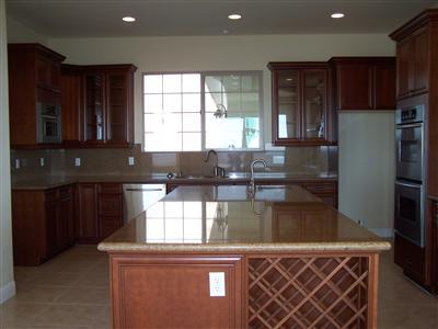 16259 Summit Ranch Road Clovis, CA 93619 - Photo 2 of 18 oversized kitchen, center island has additional storage.