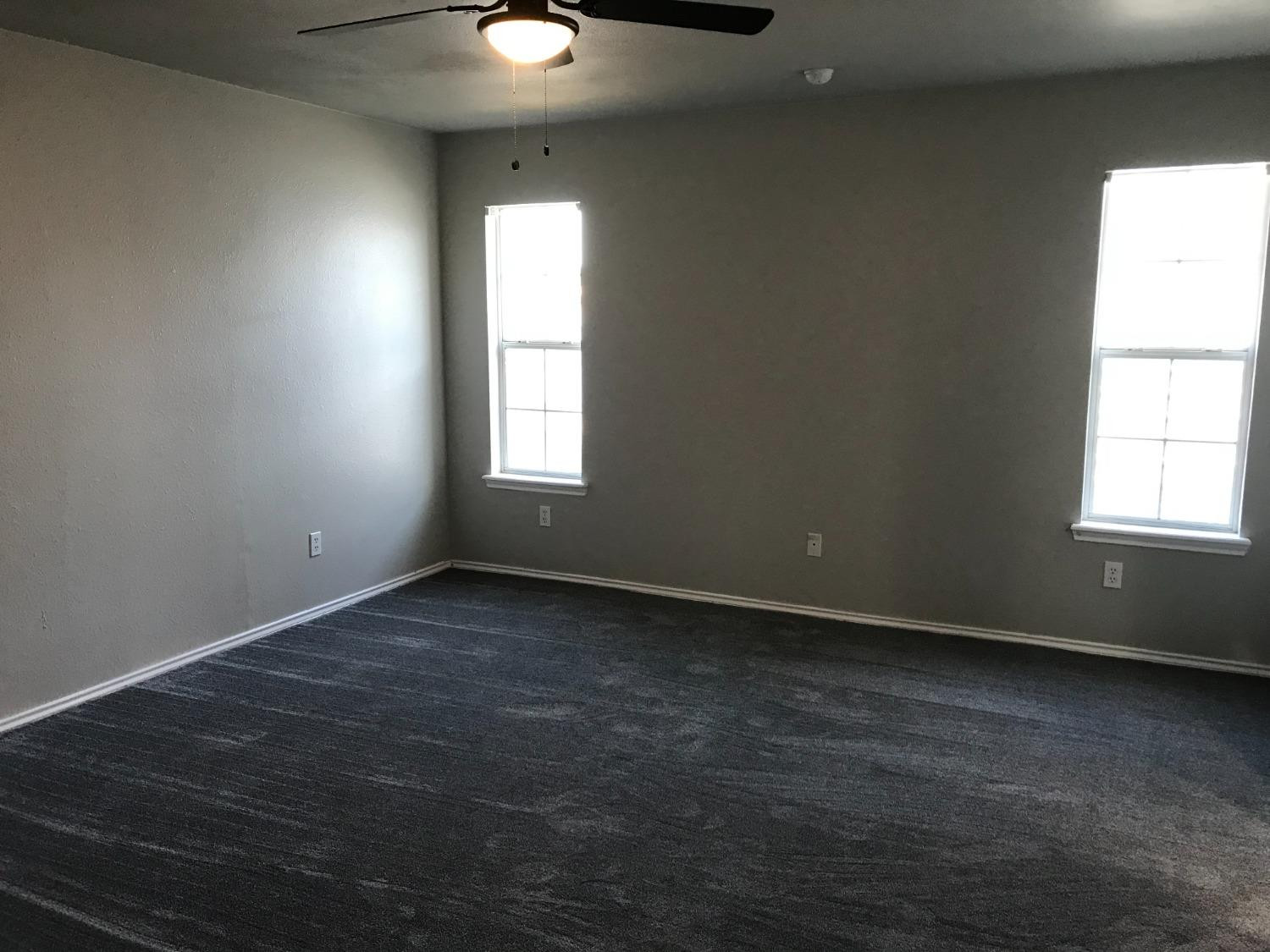 6201 5th Street Lubbock, TX 79416 - Photo 16 of 32 an empty room with a window
