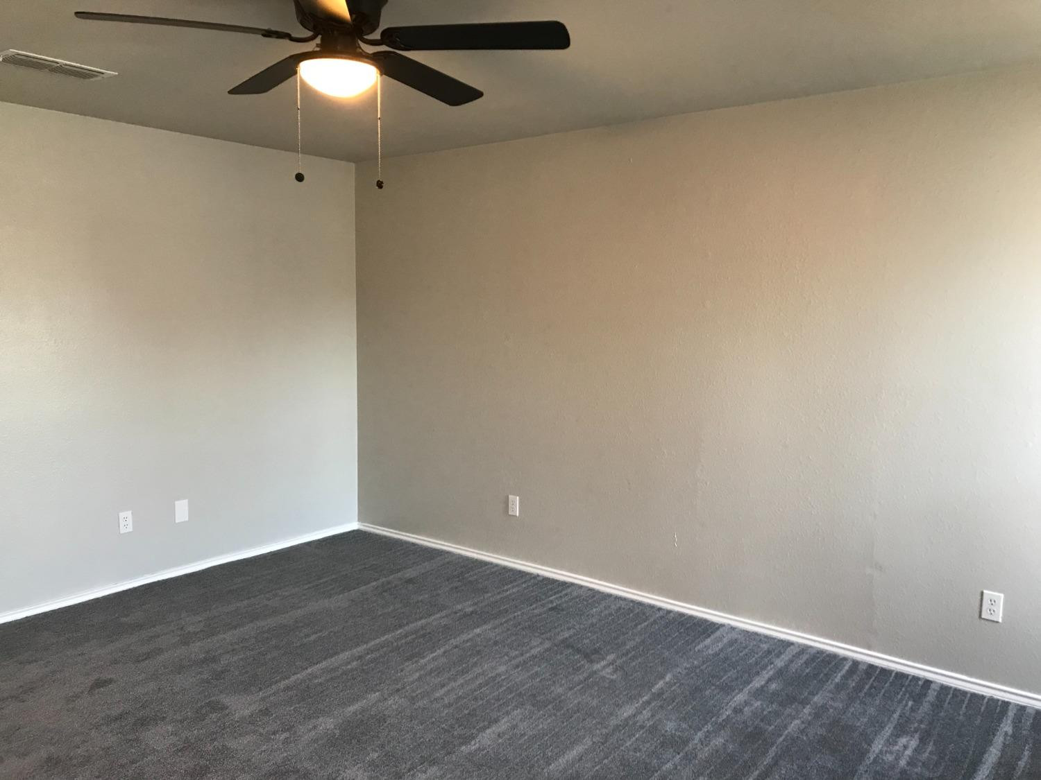 6201 5th Street Lubbock, TX 79416 - Photo 18 of 32 wooden floor in an empty room