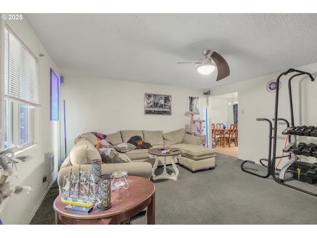 a kitchen with granite countertop cabinets stainless steel appliances and a sink