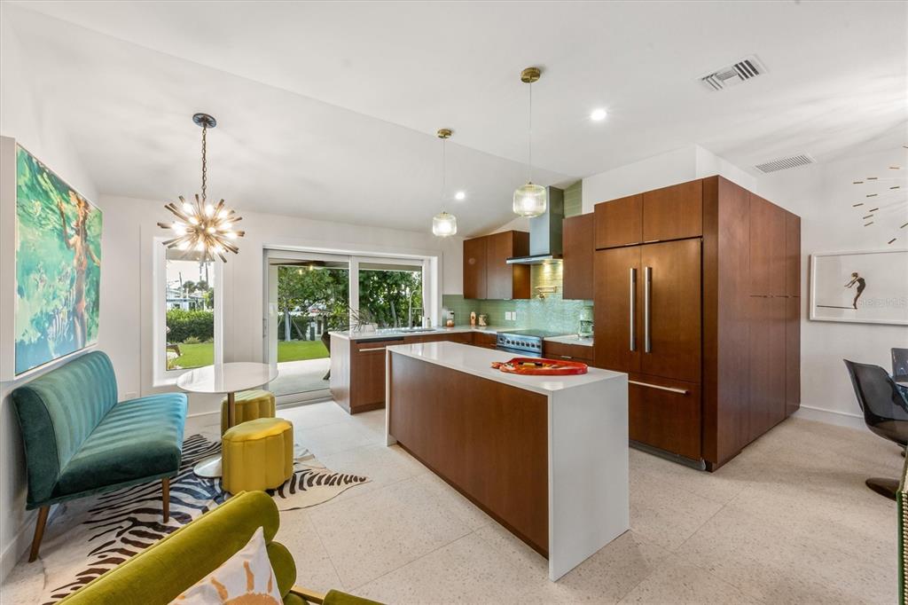505 65th Street Holmes Beach, FL 34217 - Photo 11 of 64 a living room with furniture and a large window