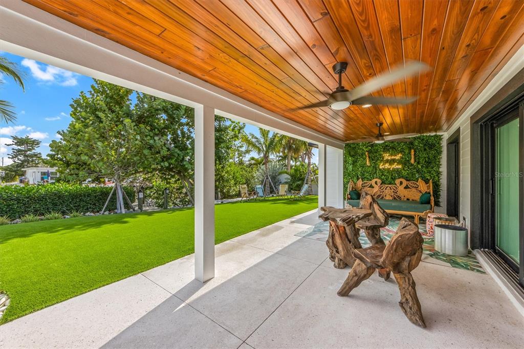 505 65th Street Holmes Beach, FL 34217 - Photo 43 of 64 a building outdoor space with seating space