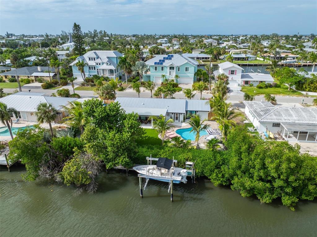 505 65th Street Holmes Beach, FL 34217 - Photo 60 of 64 an aerial view of multiple house