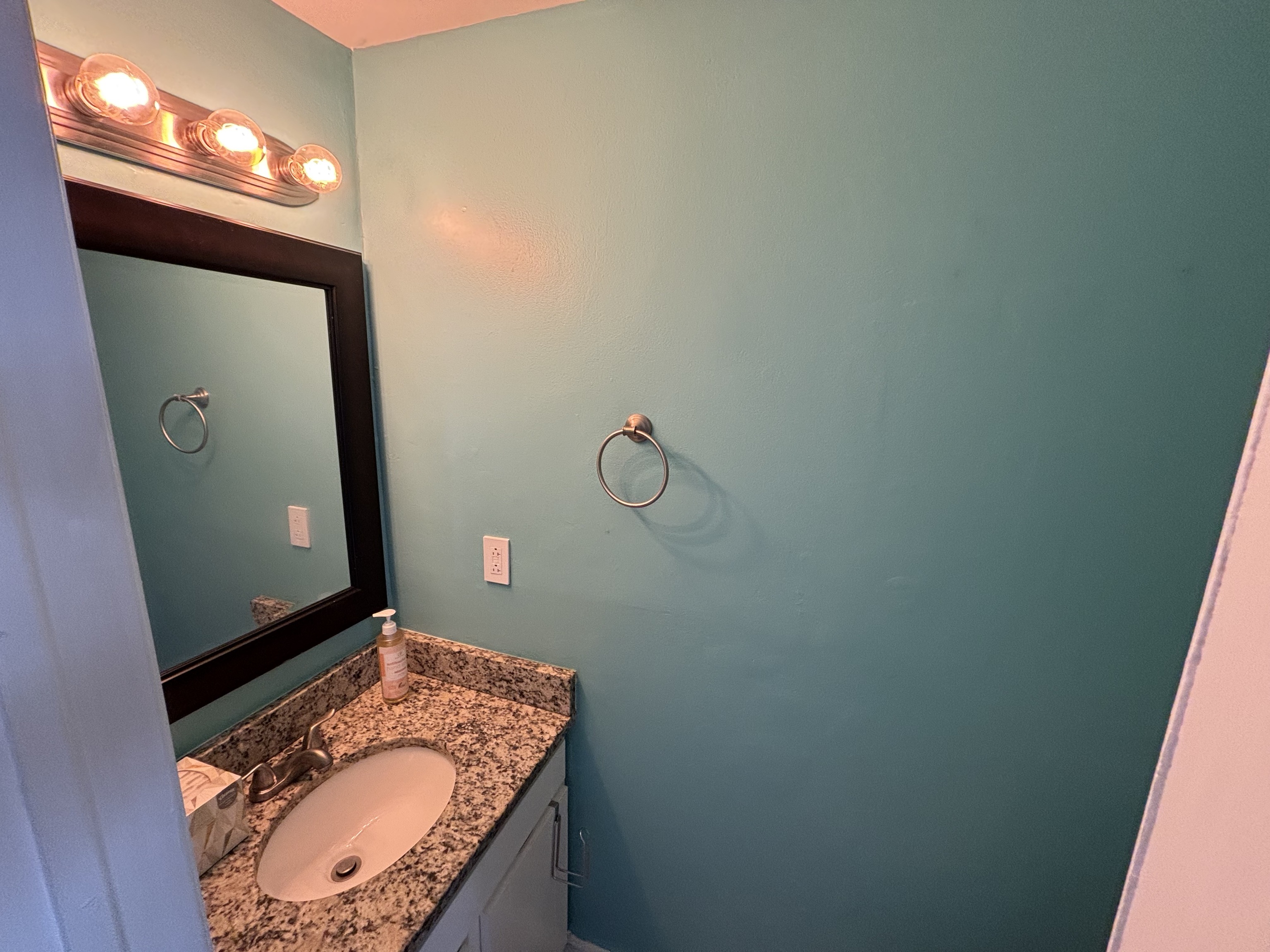 39 Horton Hill Road, Unit 9B Naugatuck, CT 06770 - Photo 4 of 10 a bathroom with a granite countertop sink and mirror