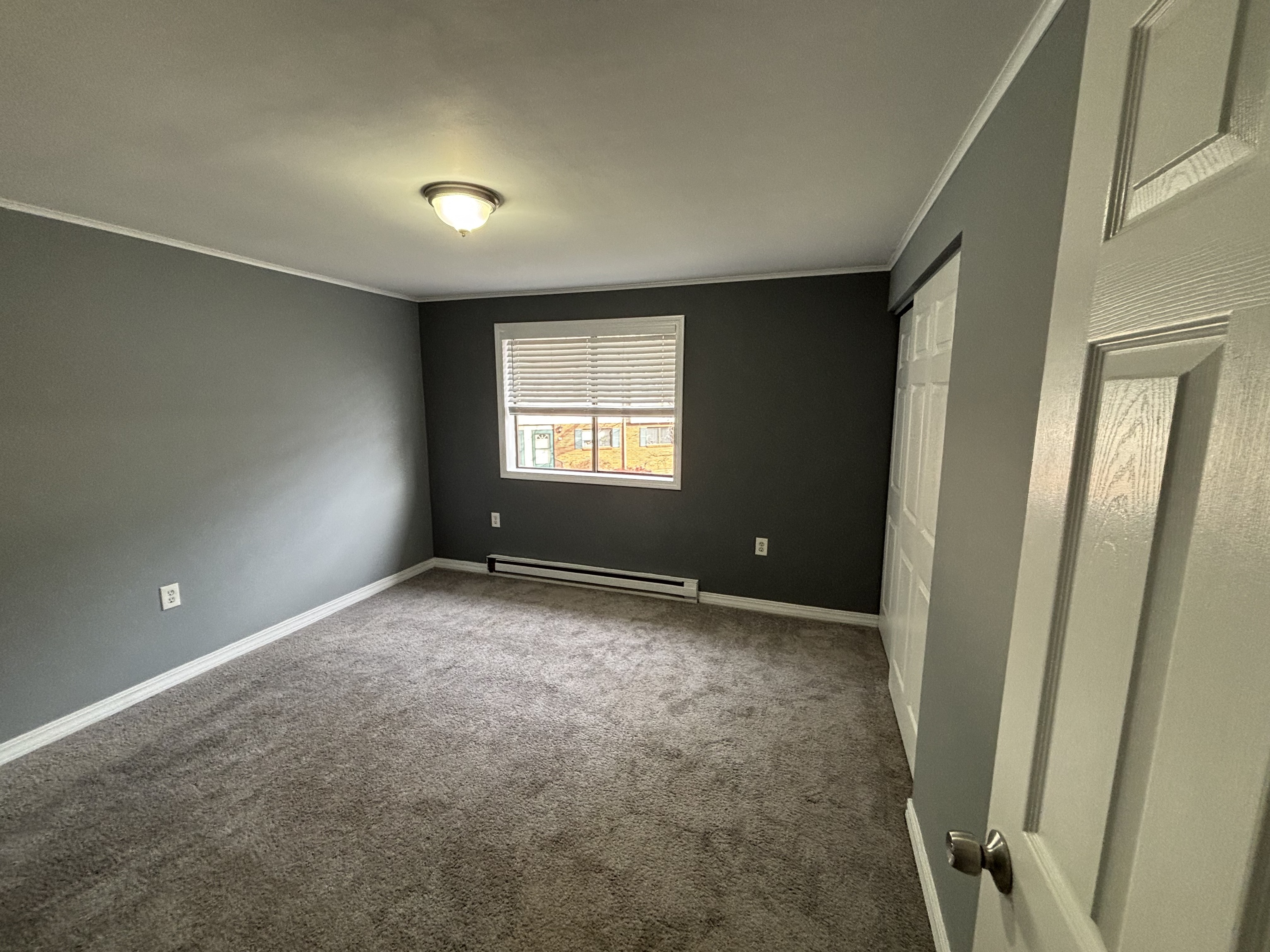 39 Horton Hill Road, Unit 9B Naugatuck, CT 06770 - Photo 6 of 10 a view of an empty room and window