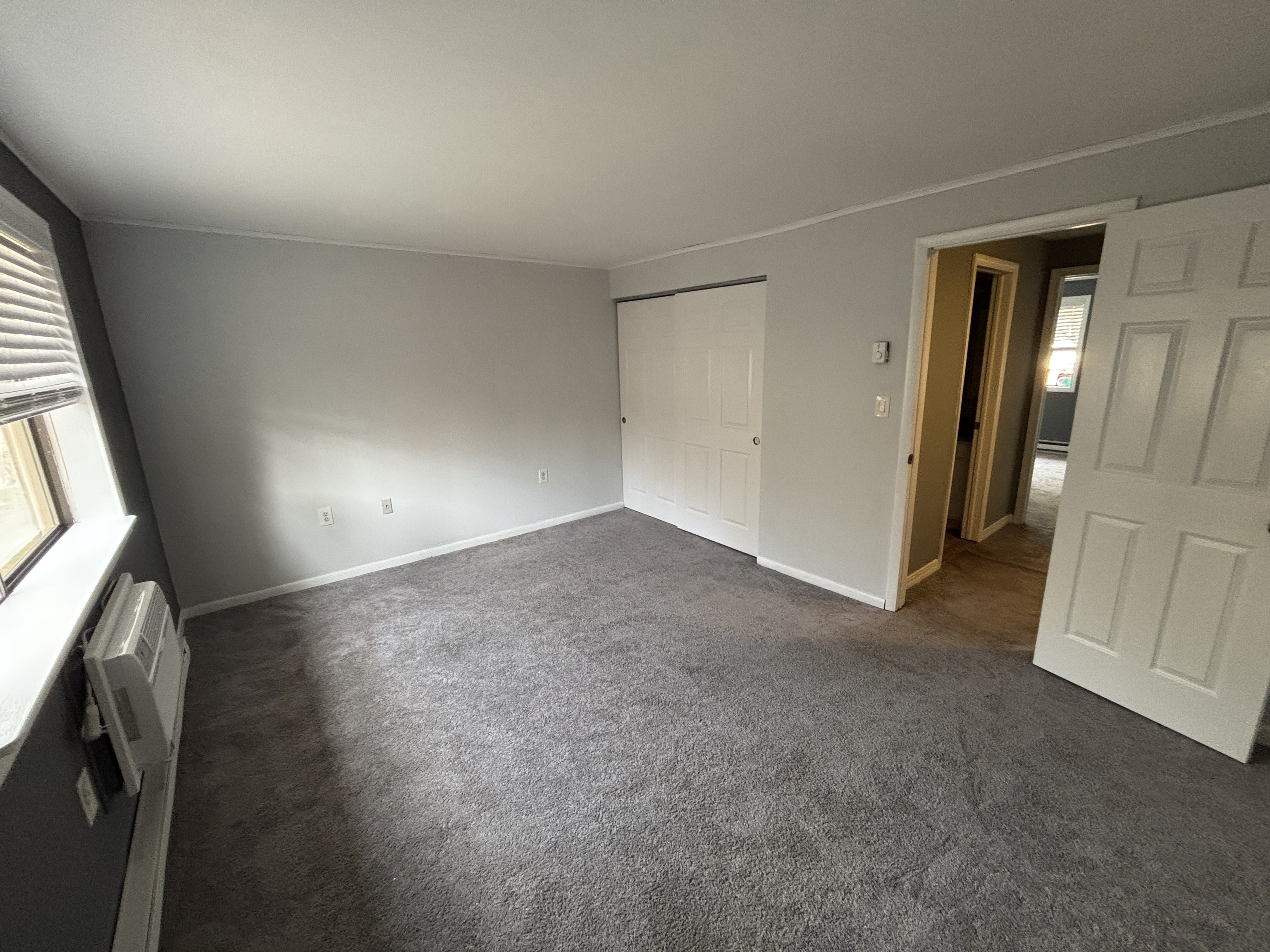 39 Horton Hill Road, Unit 9B Naugatuck, CT 06770 - Photo 8 of 10 an empty room with a natural light