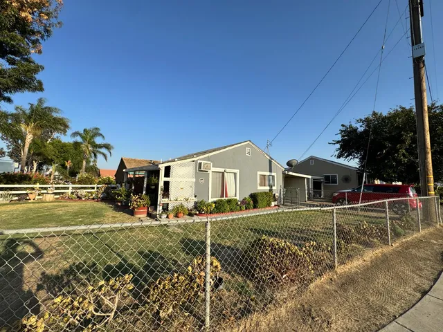front view of a house with a big yard