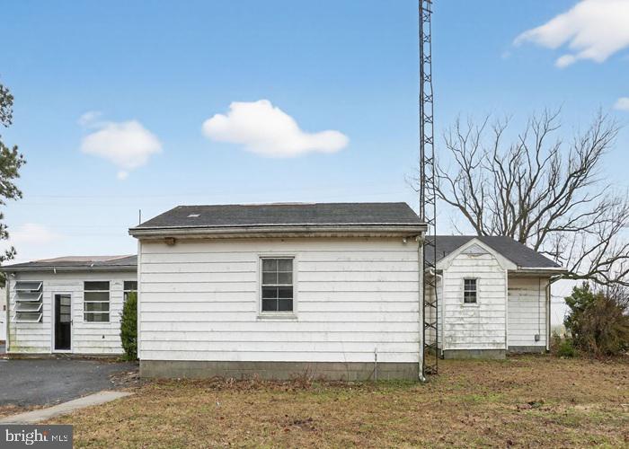 4802 Railroad Avenue Rhodesdale, MD 21659 - Photo 3 of 18 a view of a house with a backyard