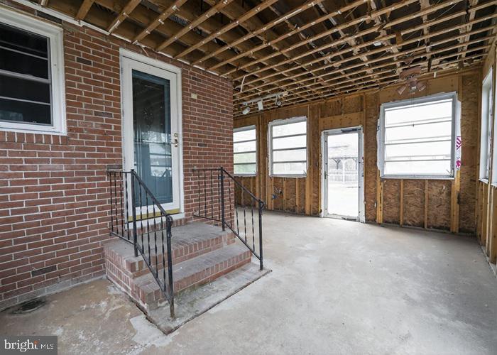 4802 Railroad Avenue Rhodesdale, MD 21659 - Photo 5 of 18 a view of livingroom with furniture and floor to ceiling window