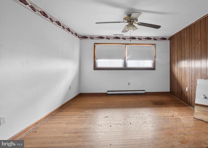 4802 Railroad Avenue Rhodesdale, MD 21659 - Photo 9 of 18 a view of a garage with a sink a window and a chandelier