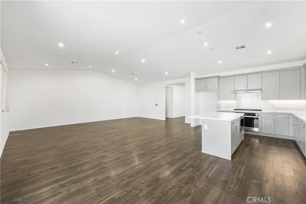 a view of kitchen with wooden floor