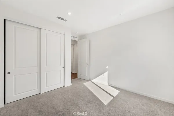 a view of small space with wooden floor