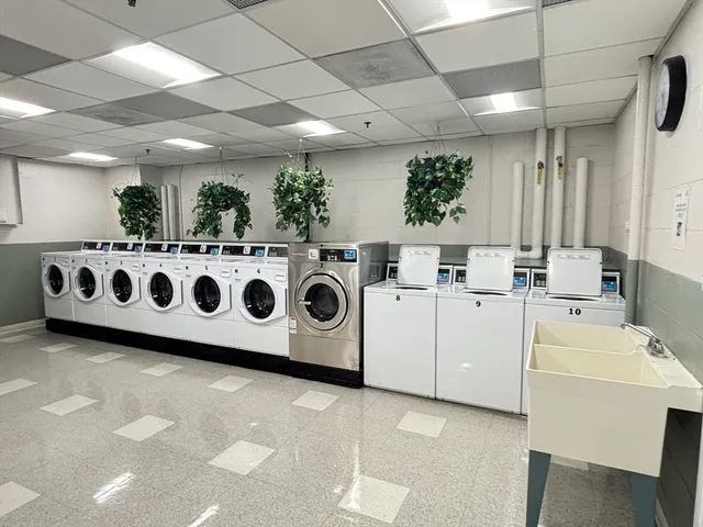 a utility room with washer and dryer