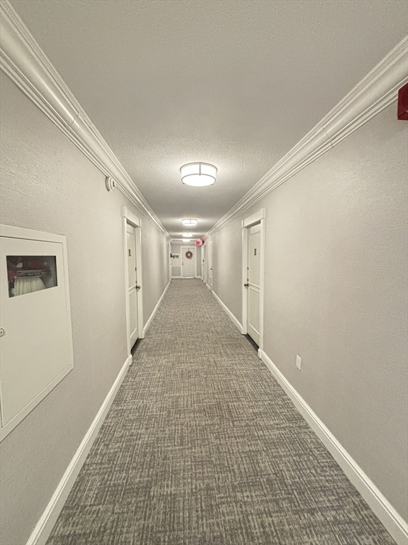 2 Hawthorne Place, Unit 7O Boston, MA 02114 - Photo 3 of 17 a view of a hallway