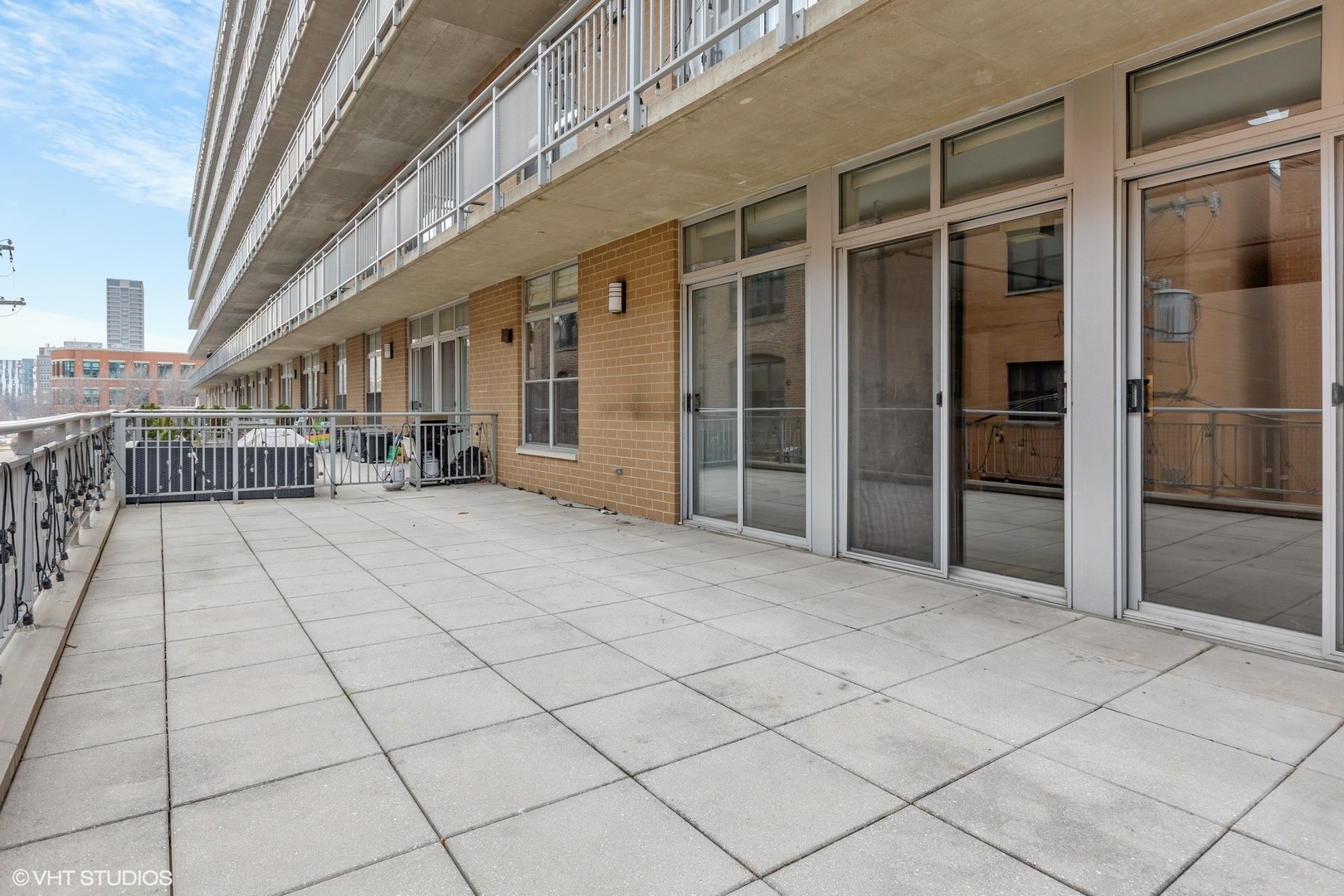 111 South Morgan Street, Unit 325 Chicago, IL 60607 - Photo 15 of 18 a view of a terrace with seating space