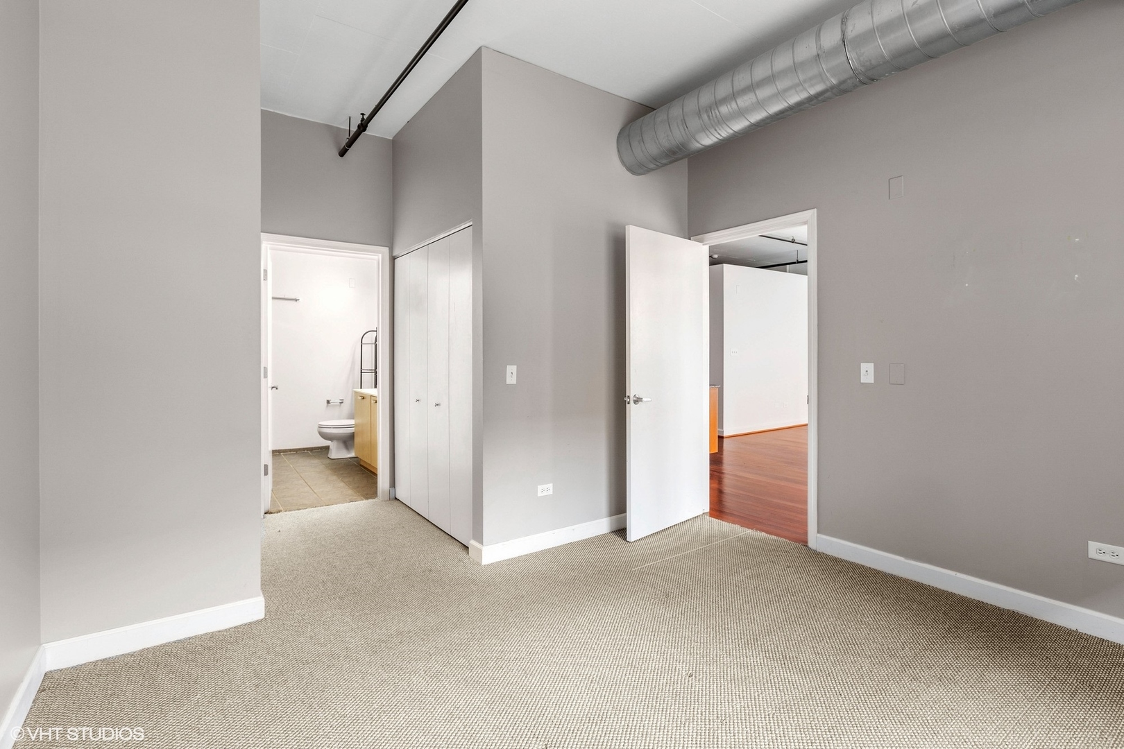 111 South Morgan Street, Unit 325 Chicago, IL 60607 - Photo 9 of 18 a view of a bathroom with a hallway