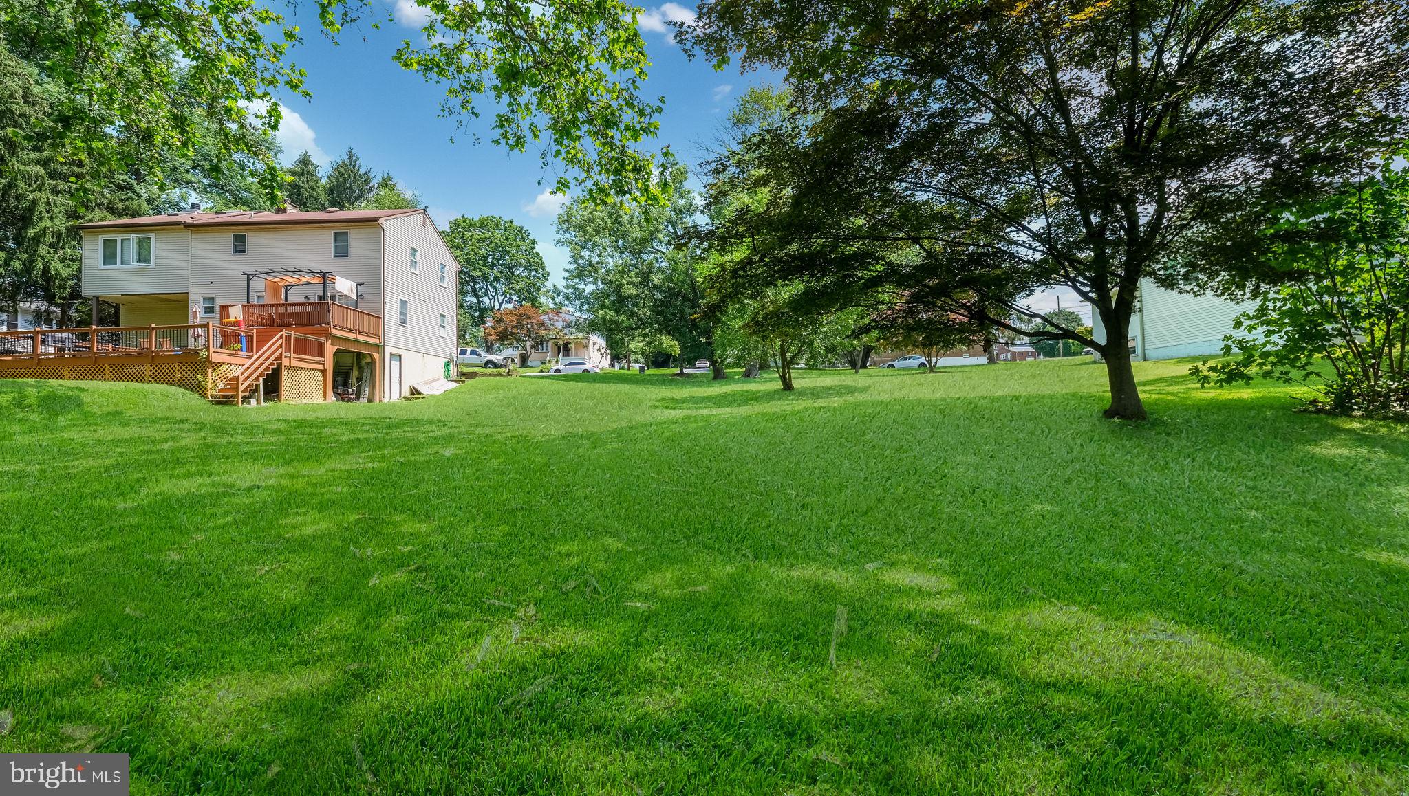 1813 Manor Avenue Marcus Hook, PA 19061 - Photo 10 of 13 a view of a yard with table and chairs and a small yard