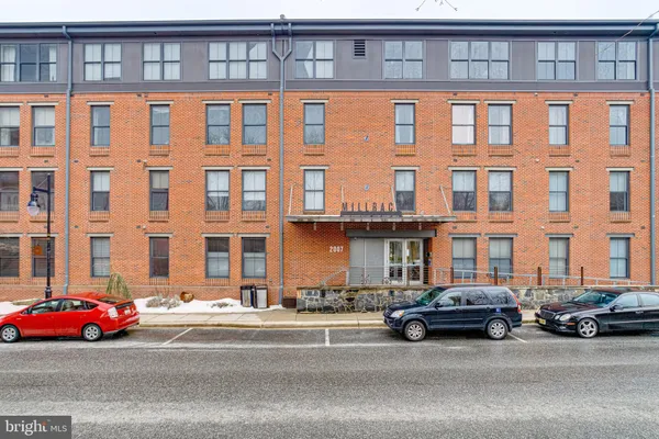 a cars parked in front of a building