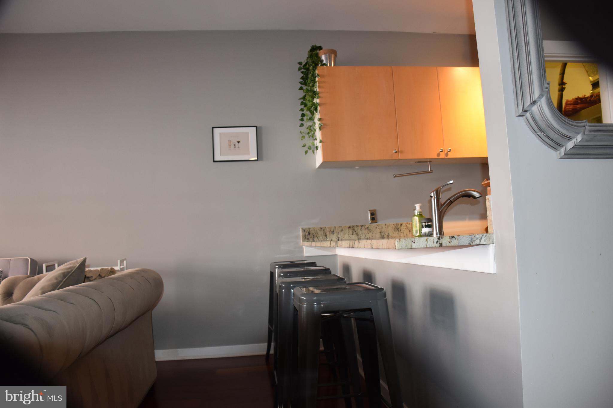 2007 Clipper Park Road, Unit 212 Baltimore, MD 21211 - Photo 11 of 33 a room with a sink and a mirror