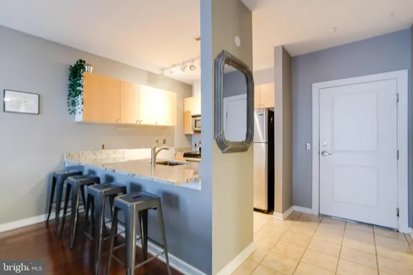 a view of a kitchen from the dining room